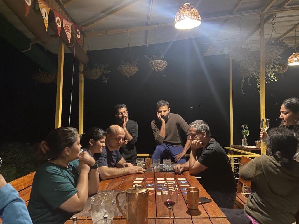 guests playing board games in a Himalayan homestay in Nainital, India